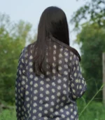 girl wearing a black printed casual shirt with photo posing ideas.