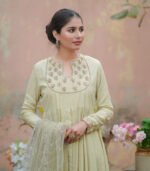 Shop with Namra is offering pastel green embroidery formal dress in latest festive collection 2024