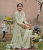 Shop with Namra is offering pastel green embroidery formal dress in latest festive collection 2024