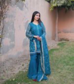 Shop with Namra is offering tea blue Pakistani formal organza dress in latest festive collection 2024