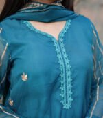 Shop with Namra is offering tea blue Pakistani formal organza dress in latest festive collection 2024